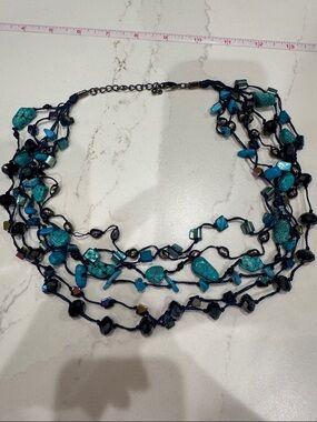 6 strand turquoise colored beads and string necklace 25”